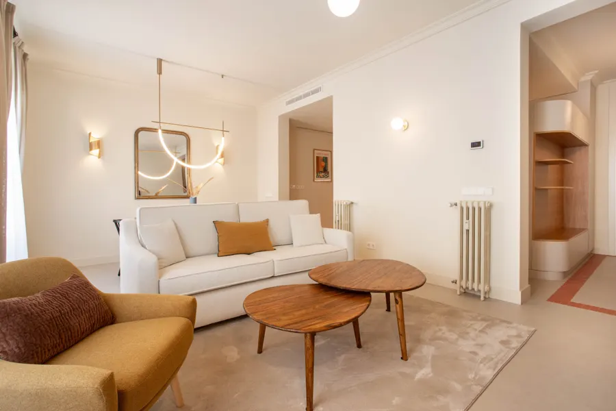 Living room with round walnut coffee tables